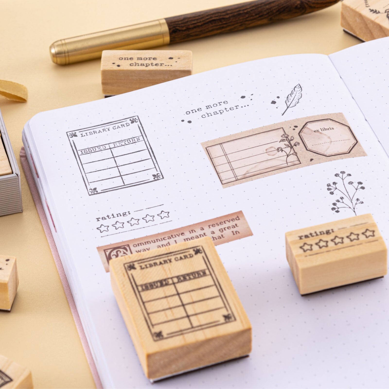 Our Stories reading journal stamps with Our Stories washi tapes on white paper