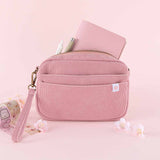 Tsuki ‘Sakura Journey’ Limited Edition Travel Notebook inside Tsuki ‘Sakura Journey’ Travel Pouch with micron pen with Tsuki ‘Sakura Journey’ Vintage Journal Washi Tapes with cherry blossoms in pink background