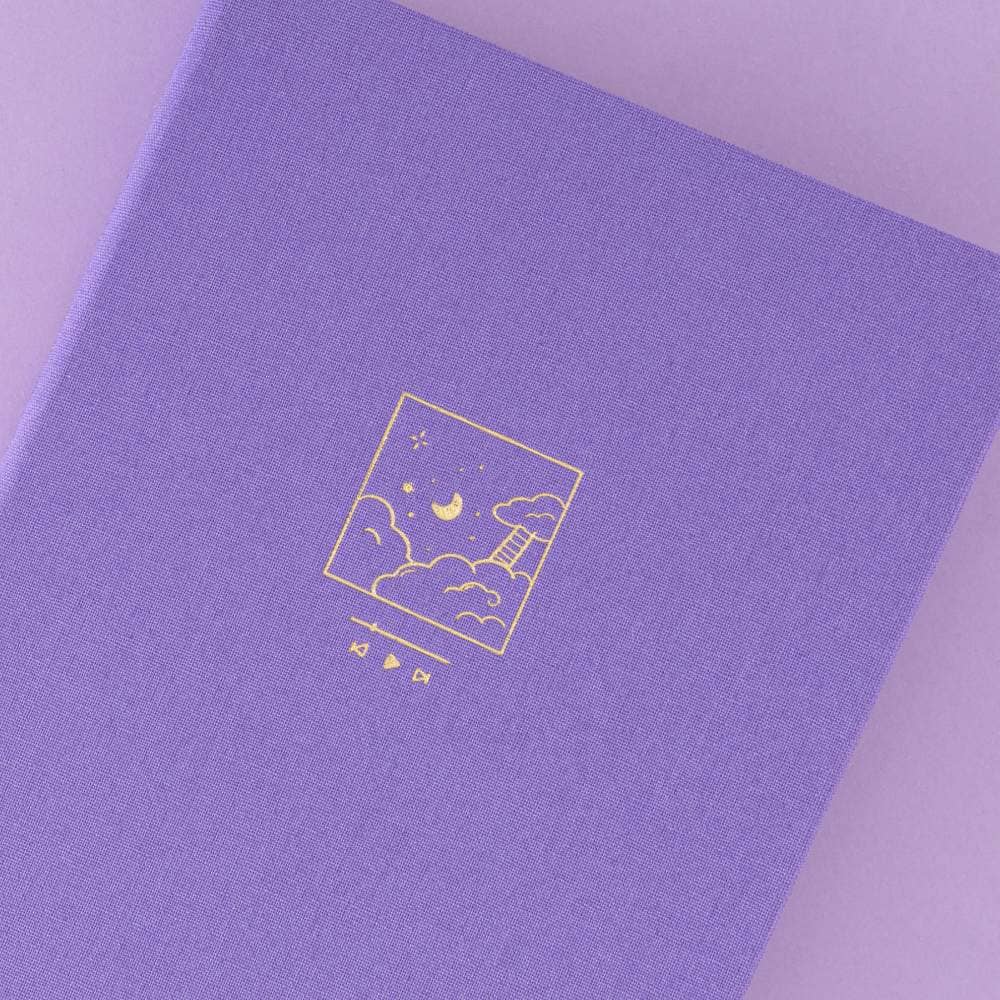 Tsuki Twilight Hour notebook with gold foil cloud design on purple linen cover