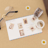 Tsuki Light Academia PET stamp tape cut up and stuck on post card