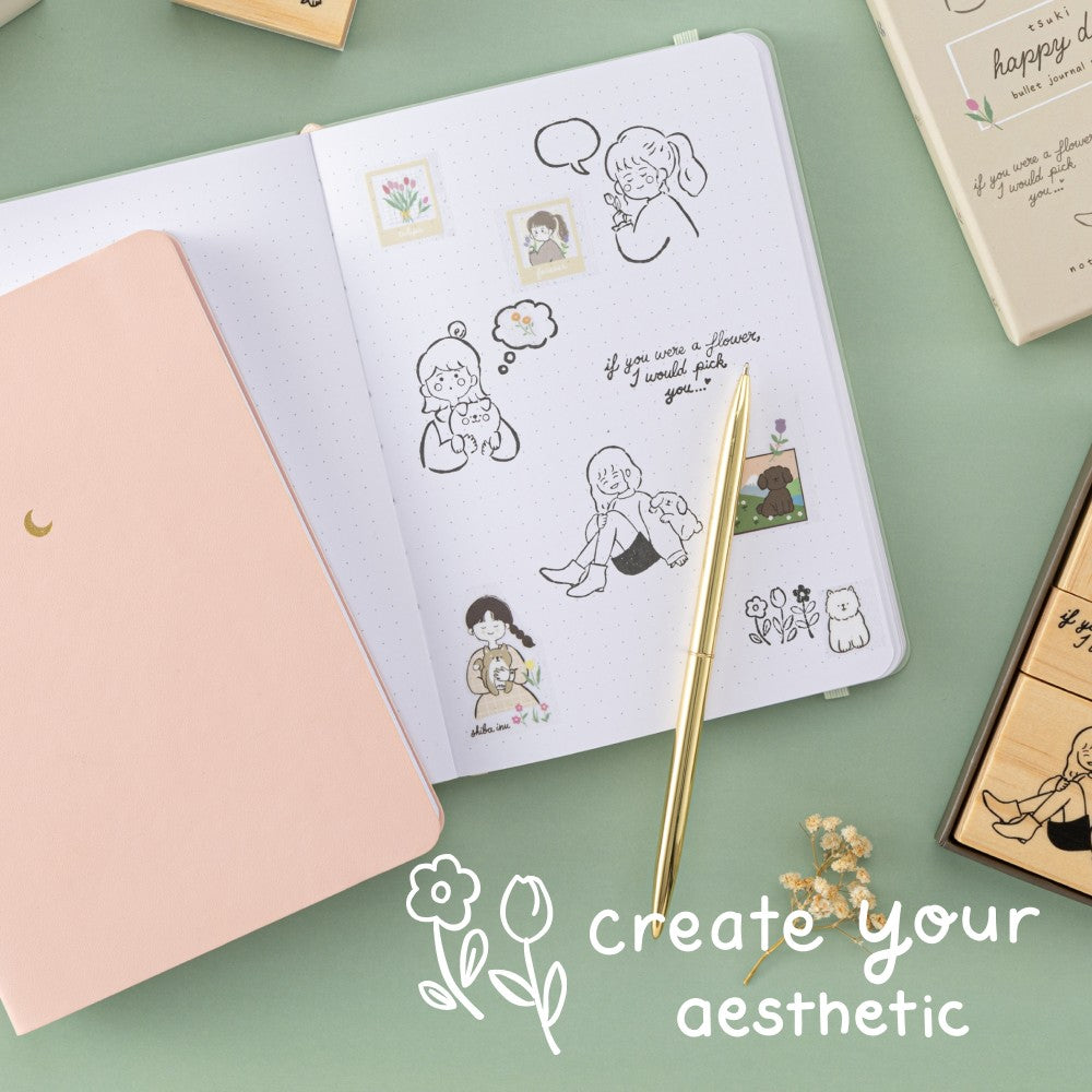 Stamp swatch on bullet journal with the text “create your aesthetic”