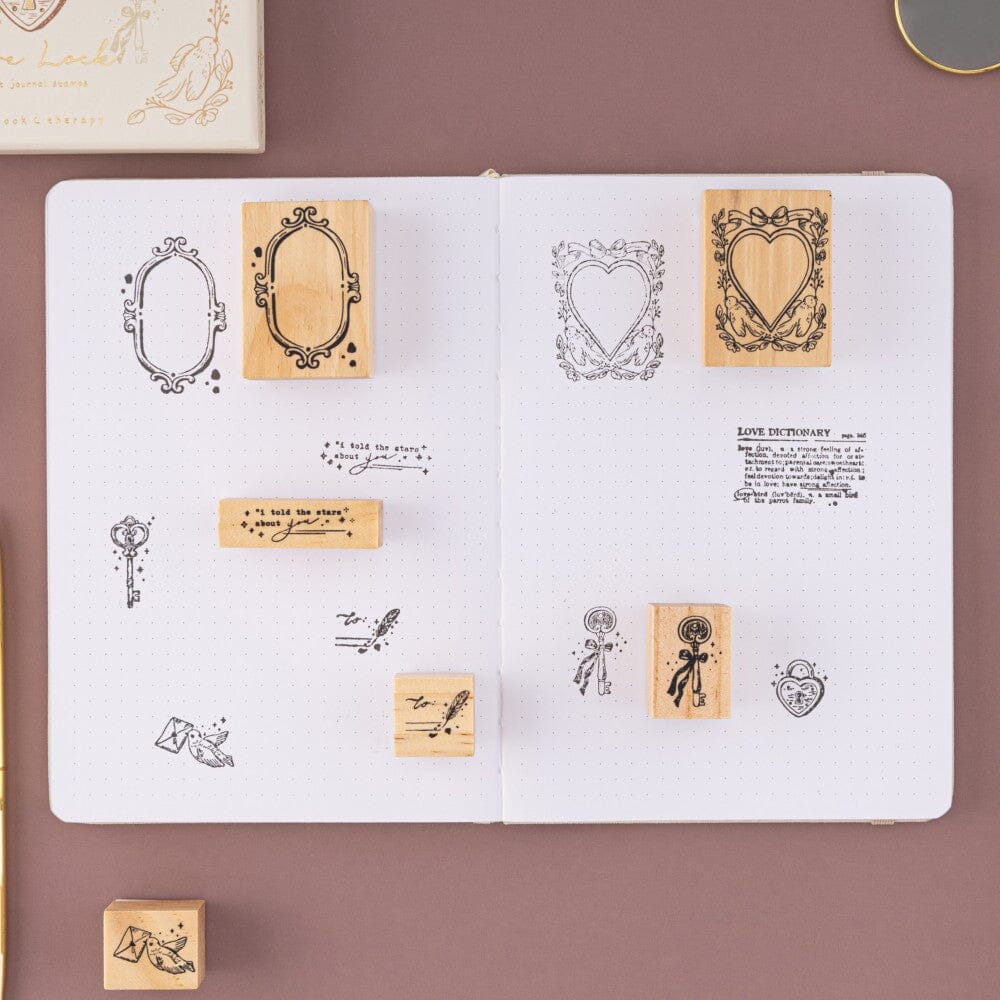 Tsuki Love Lock stamps on bullet journal page spread