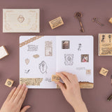 Hand stamping little dove with letter in mouth stamp on bullet journal spread