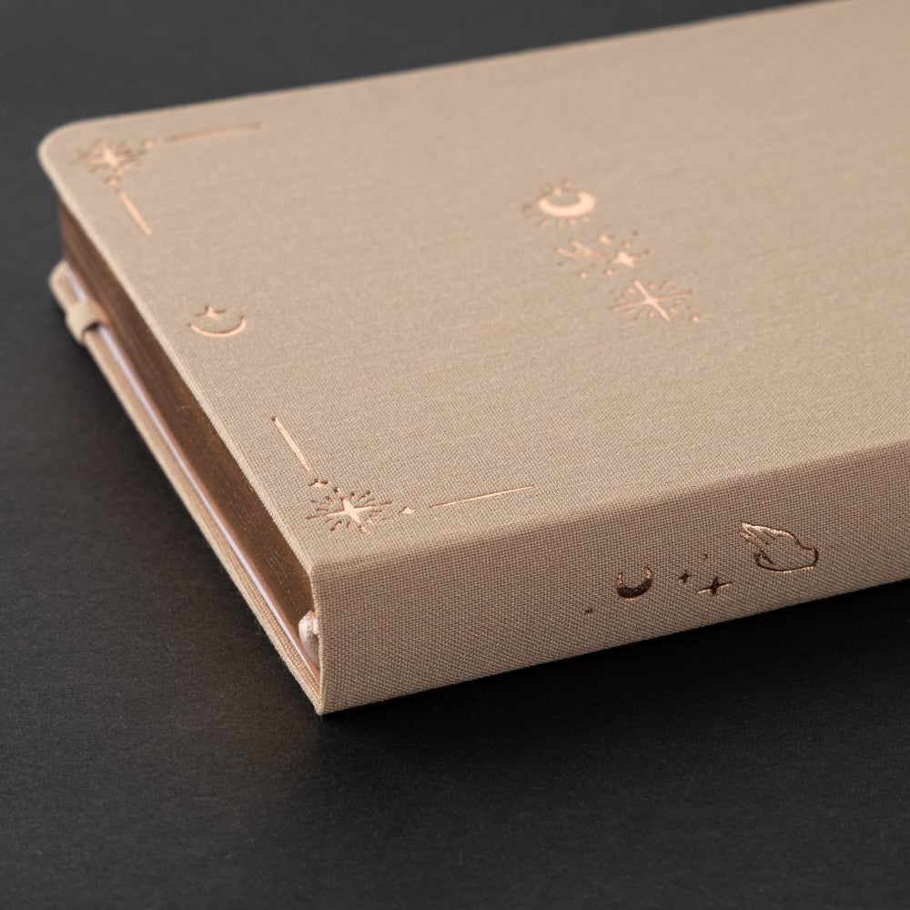 Close up of rose gold details of Tsuki Stardust Dawn Bullet Journal