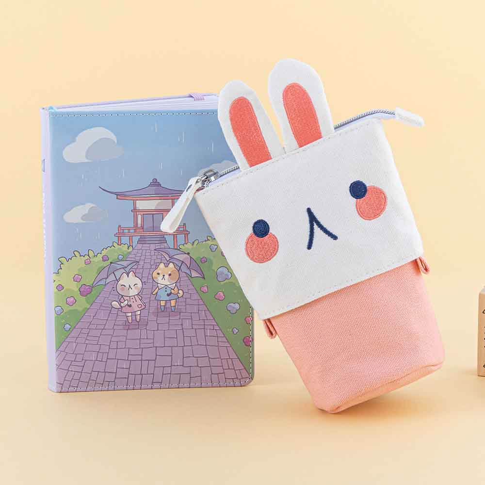 Tsuki ‘Four Seasons’ Embroidered Pop-Up Pencil Case by Notebook Therapy x Milkkoyo in bunny with Tsuki ‘Four Seasons: Summer Edition’ Bullet Journal in honey yellow background