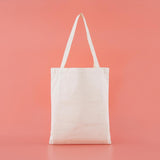 Back of Tsuki ‘Moonflower’ Limited Edition Tote Bag in coral pink background