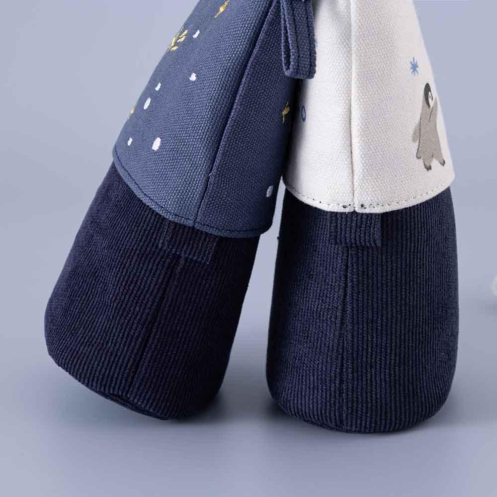 Tsuki ‘Dreams of Snow’ Pop-Up Pencil Cases in Starry Night and Playful Penguin in light blue background