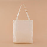 The back of Tsuki ‘Vintage Kinoko’ Tote Bag in beige background