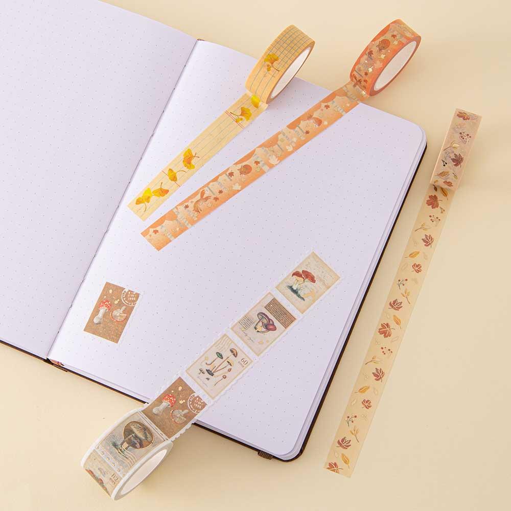 Tsuki ‘Maple Dreams’ Washi Tape Set rolled out on open bullet journal page on cream background