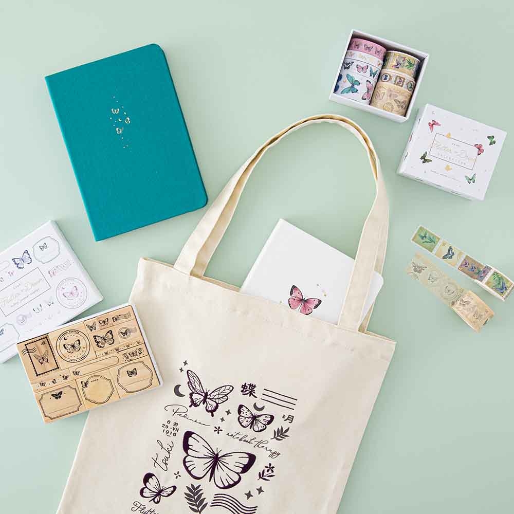 Tsuki ‘Flutter + Dream’ Tote Bag by Notebook Therapy x Pelinkan with Tsuki Teal Sky ‘Flutter + Dream’ Limited Edition Bullet Journal by Notebook Therapy x Pelinkan and Tsuki Cloud White ‘Flutter + Dream’ Limited Edition Bullet Journal by Notebook Therapy x Pelinkan and Tsuki ‘Flutter + Dream’ Washi Tapes by Notebook Therapy x Pelinkan and Tsuki ‘Flutter + Dream’ Bullet Journal Stamps by Notebook Therapy x Pelinkan on mint background