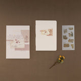 Tsuki Junk Journal flatlay with luxury gift box and free sticker sheet