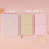 Flatlay of 3x sakura themed notebooks