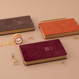 Tsuki Kraft Paper Limited Edition Bullet Journal in Kitsune and Kinoko and Nara with free bookmark gifts and Tsuki ‘Maple Dreams’ Washi Tapes with gold pen and dried flowers on beige background