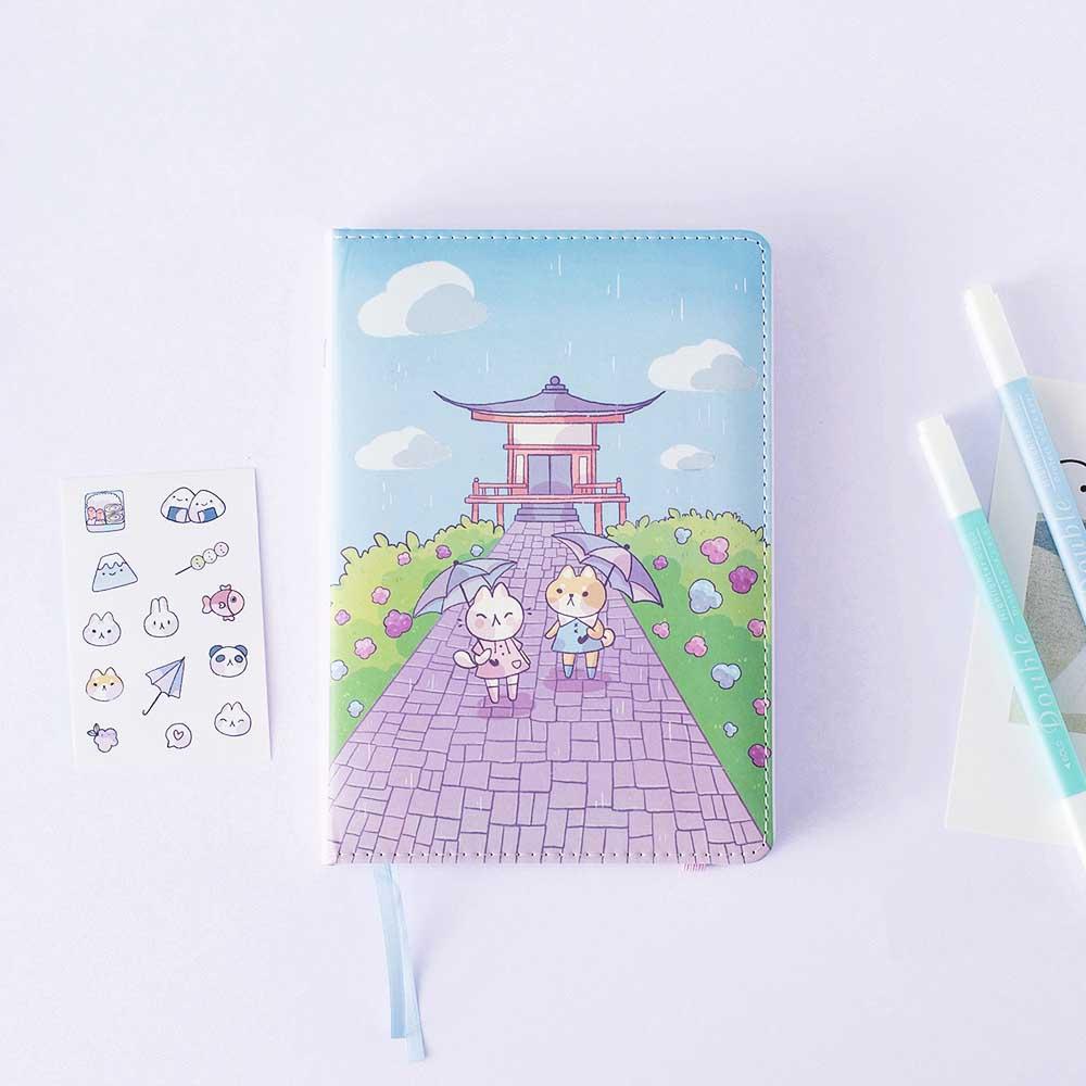 Tsuki Four Seasons: Summer Edition Bullet Journal designed with @milkkoyo with free sticker sheet with pens and postcard on lilac background