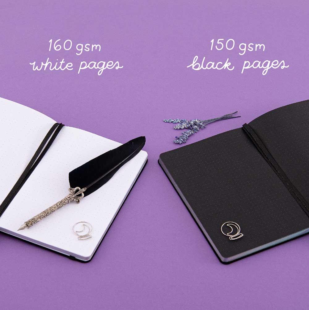 Tsuki ‘Moonlit Spell’ Limited Edition Holographic Bullet Journal with 160GSM white pages or 150GSM black paper with free bookmark gift with black feather quill and lavender sprigs on purple background