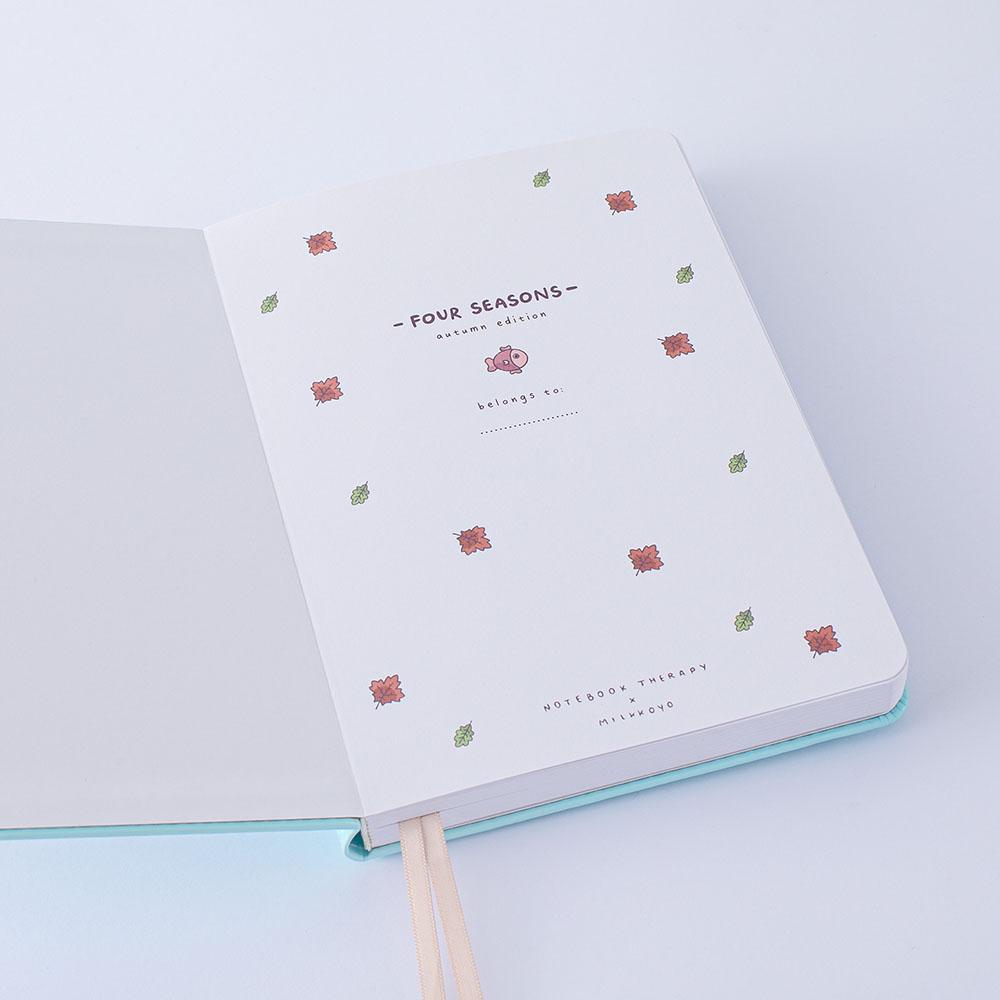 Open front page of Tsuki ‘Four Seasons: Autumn Edition’ Bullet Journal made with milkkoyo on lilac background