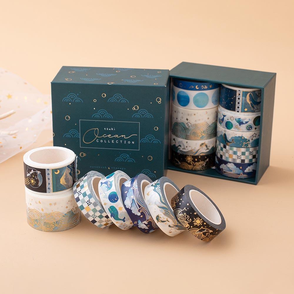 Tsuki Ocean Edition Washi Tapes and sticker sheet set with reusable eco-friendly gift box on peach background
