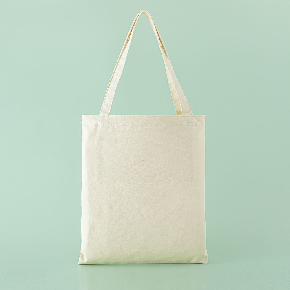 Back of Tsuki ‘Flutter + Dream’ Tote Bag by Notebook Therapy x Pelinkan in mint background