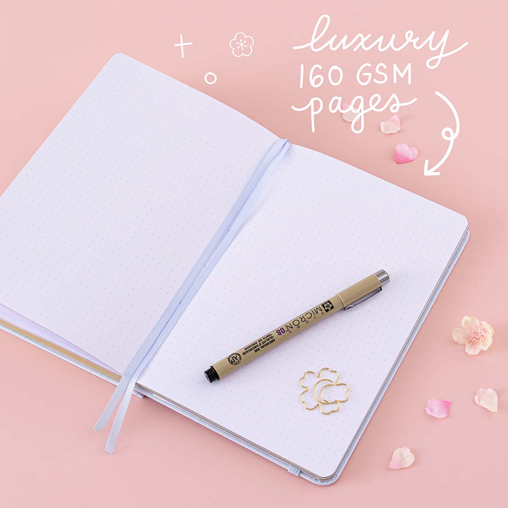 Open Tsuki ‘Sakura Journey’ Limited Edition Bullet Journal with 160GSM pages with pen with cherry blossom petals on pink background