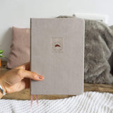 Hand holding Tsuki Fuji-san Bullet Journal