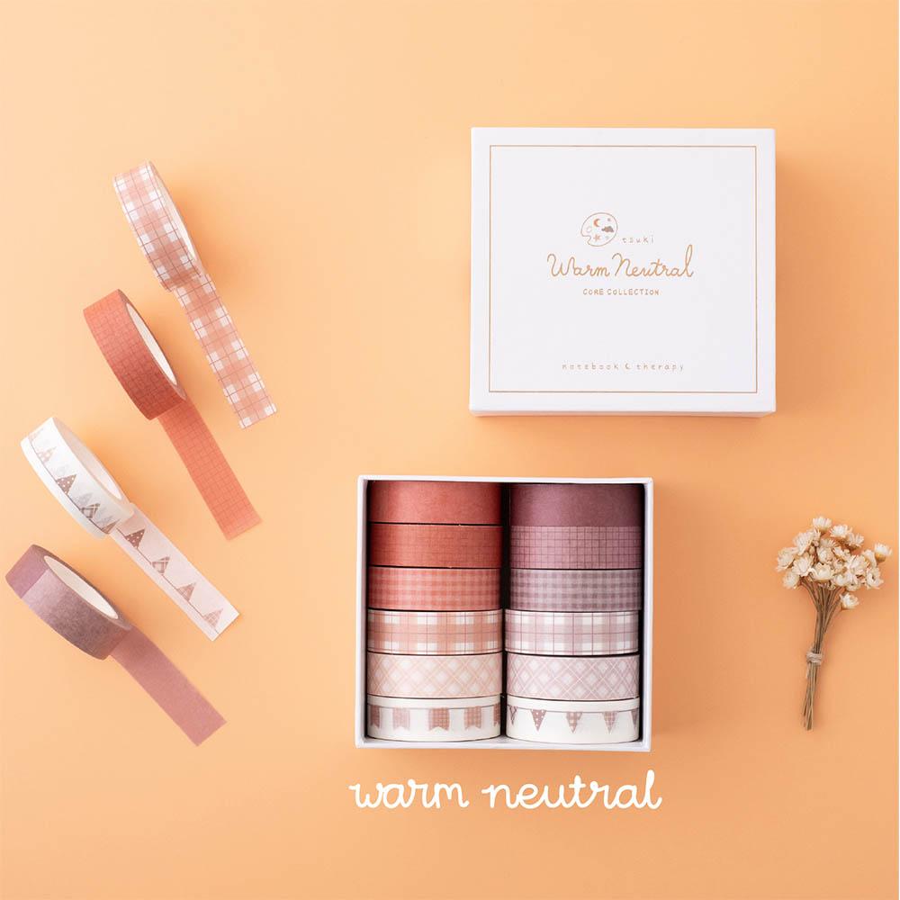 Tsuki Core Washi Tape Set in Warm Neutral with luxury eco-friendly gift box packaging and flowers on orange peach background