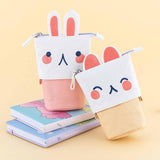 Tsuki ‘Four Seasons’ Embroidered Pop-Up Pencil Case by Notebook Therapy x Milkkoyo in kitty and bunny on Tsuki ‘Four Seasons: Spring Edition’ Bullet Journal and  Tsuki ‘Four Seasons: Summer Edition’ Bullet Journal in honey yellow background