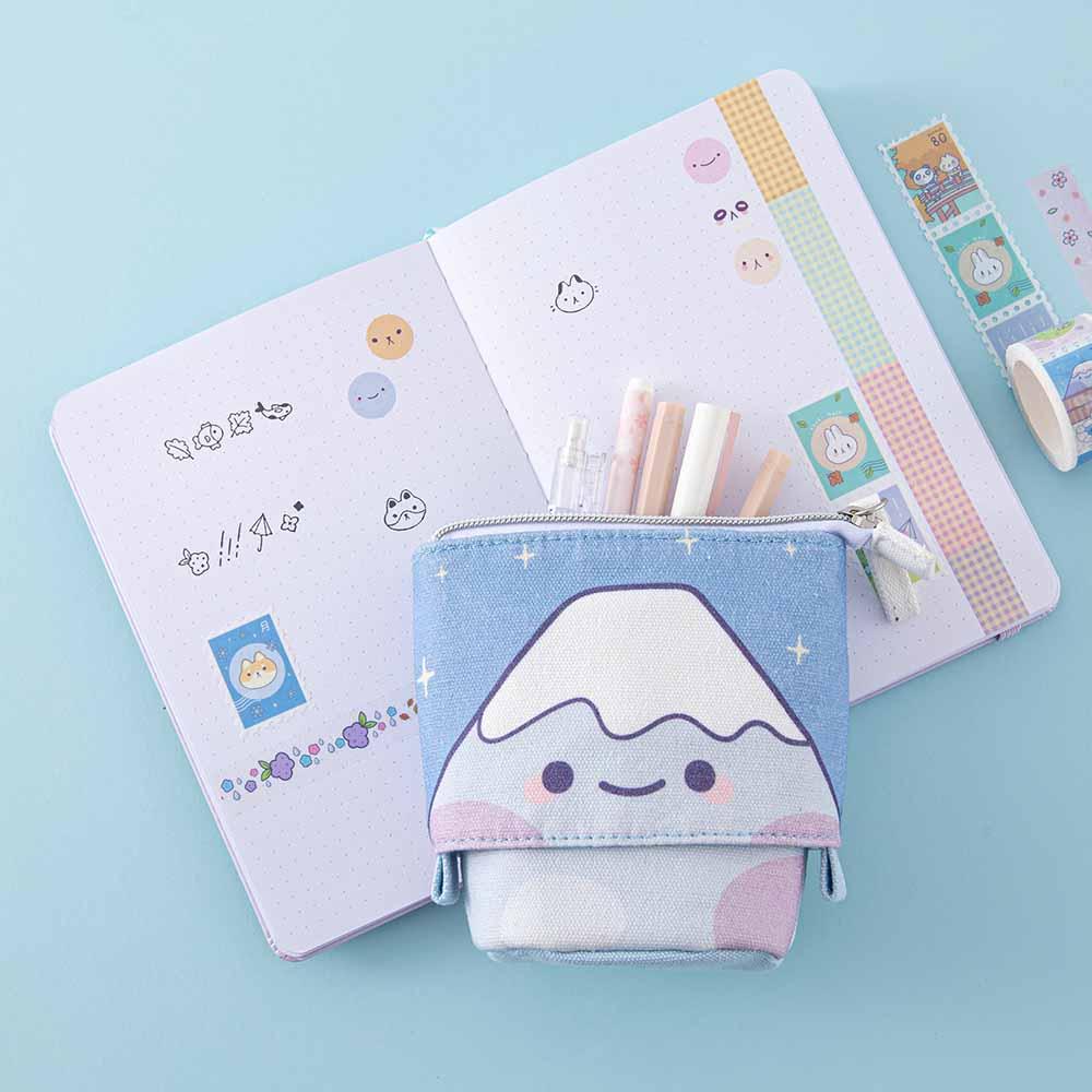 Tsuki ‘Four Seasons’ Fuji Pop-Up Pencil Case by Notebook Therapy x Milkkoyo on open bullet journal page spread with Tsuki ‘Four Seasons’ Washi Tapes on light blue background