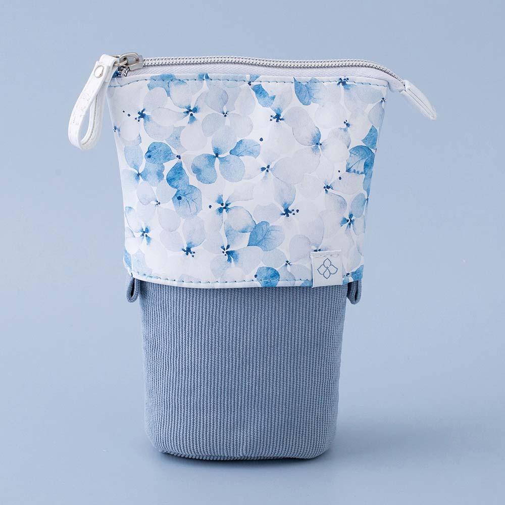 Tsuki Endless Summer Pop-Up Pencil case in Petal Blue in light blue background