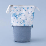 Tsuki Endless Summer Pop-Up Pencil case in Petal Blue in light blue background