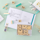 Tsuki ‘Flutter + Dream’ Bullet Journal Stamp Set by Notebook Therapy x Pelinkan on open Tsuki Teal Sky ‘Flutter + Dream’ Limited Edition Bullet Journal by Notebook Therapy x Pelinkan with Tsuki ‘Flutter + Dream’ Pop-Up Pencil Case by Notebook Therapy x Pelinkan and Tsuki ‘Flutter + Dream’ Washi Tapes by Notebook Therapy x Pelinkan on mint background