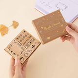 Tsuki ‘Maple Dreams’ Bullet Journal Stamp Set held in hands with autumn leaves and Tsuki ‘Kitsune’ Limited Edition Fox  Bullet Journal  on cream background