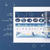 Swatch of the tsuki Gentle Giant washi tape set on white paper against a blue background