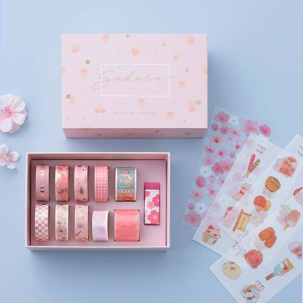 Tsuki 'Sakura Edition' Washi Tape Set with sakura blooms on light blue background