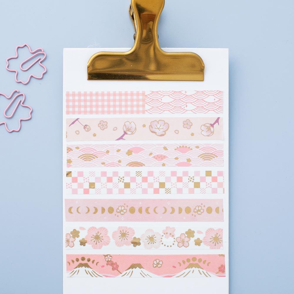 Tsuki 'Sakura Edition' Washi Tape Set on white clipboard with bookmark clips on light blue background