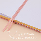 Close up of 2x ribbon bookmarks