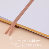 Close up of 2x ribbon bookmarks