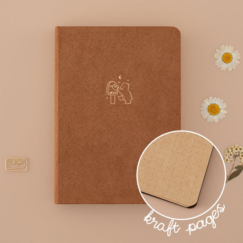 Tsuki Kuma brown velvet bear bullet journal with circle graphic showing kraft paper page