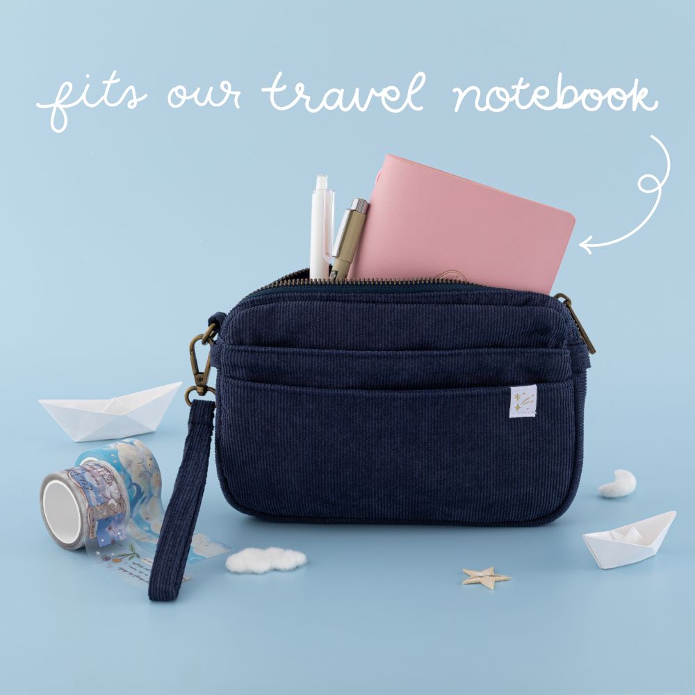 Tsuki ‘Cloud Dreamland’ Travel Pouch with Tsuki ‘Sakura Journey’ Limited Edition Travel Notebook, micron and gelly roll inside and writing that says “fits our travel notebook"