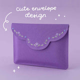 Purple envelope pouch with embroidered flower details and text that says “cute envelope design”