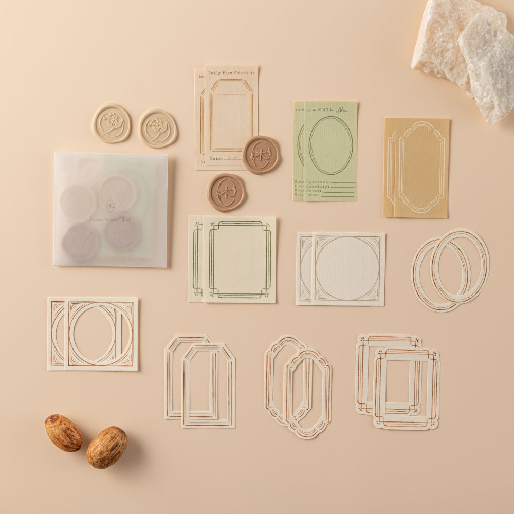 Wax seal stickers and paper frames on beige background