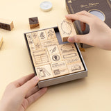Tsuki Our Stories rubber stamp box with hand taking out a frame border stamp from the set