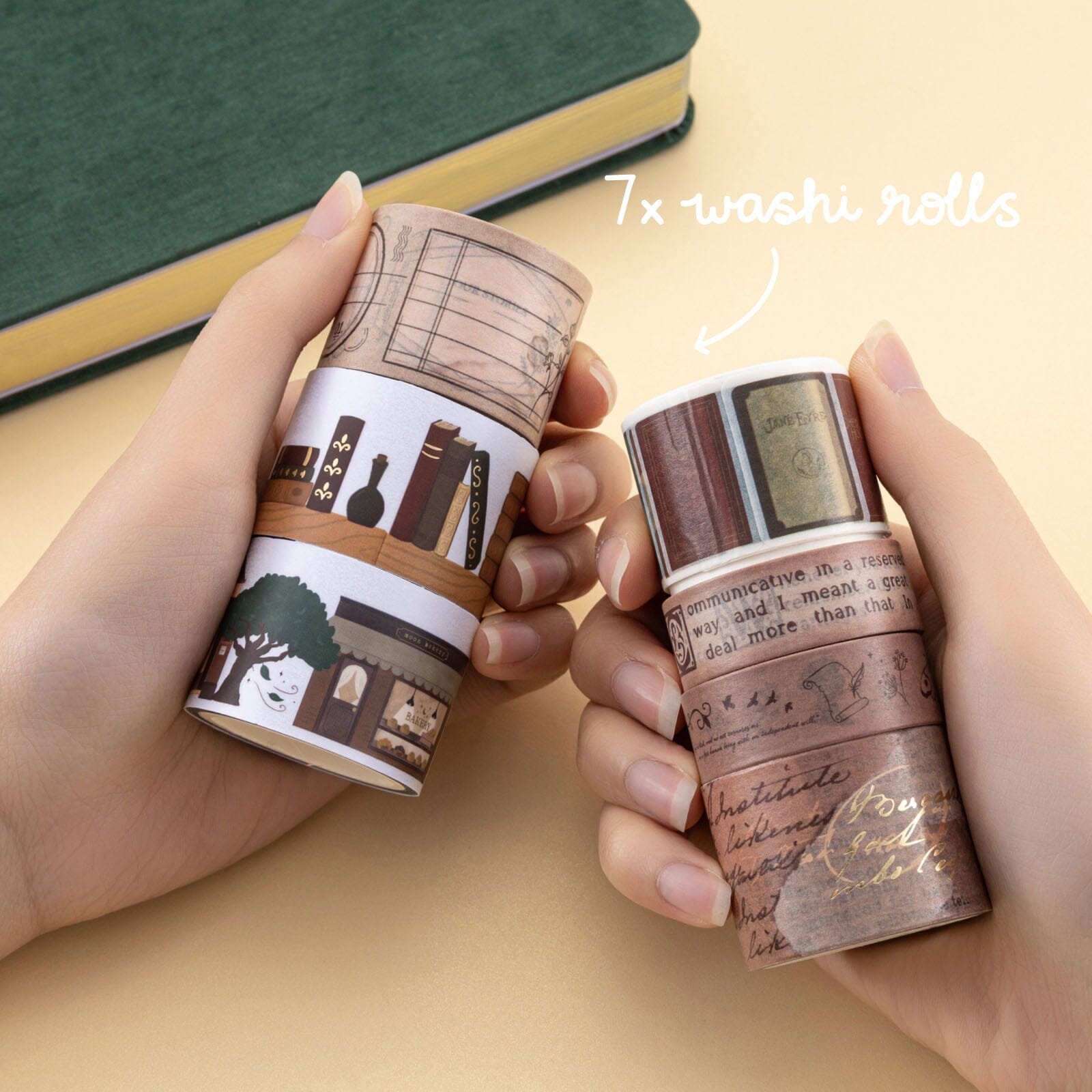 Hands holding 7x washi rolls with bookstagram designs