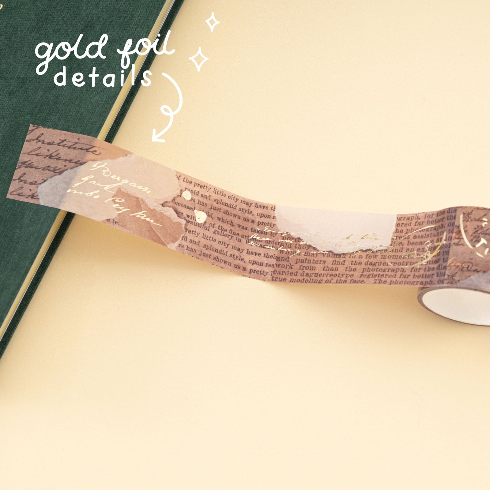 Gold fol details on the collage style washi tape roll with book pages and ripped paper