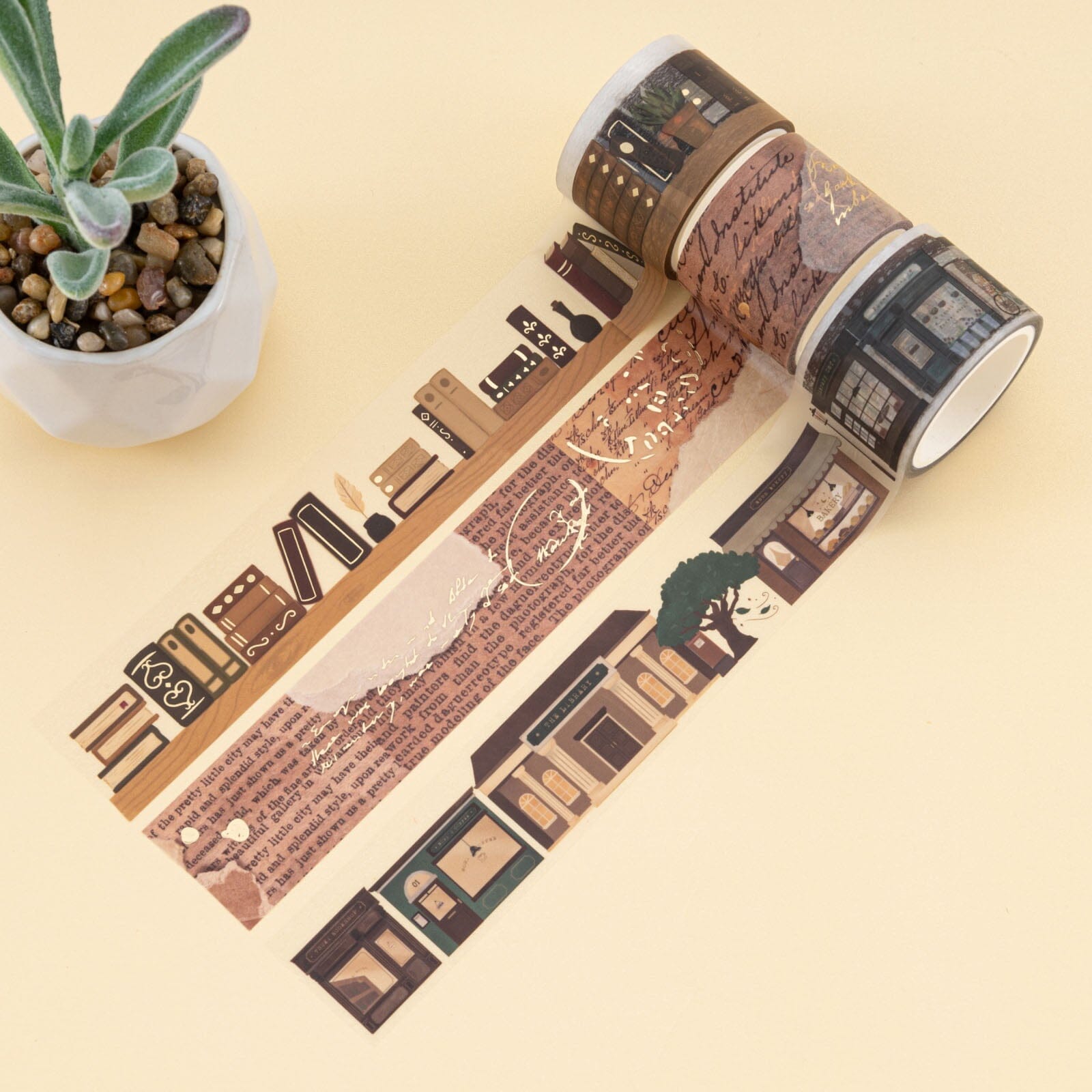 3x washi tape rolls with bookish aesthetic on cream background