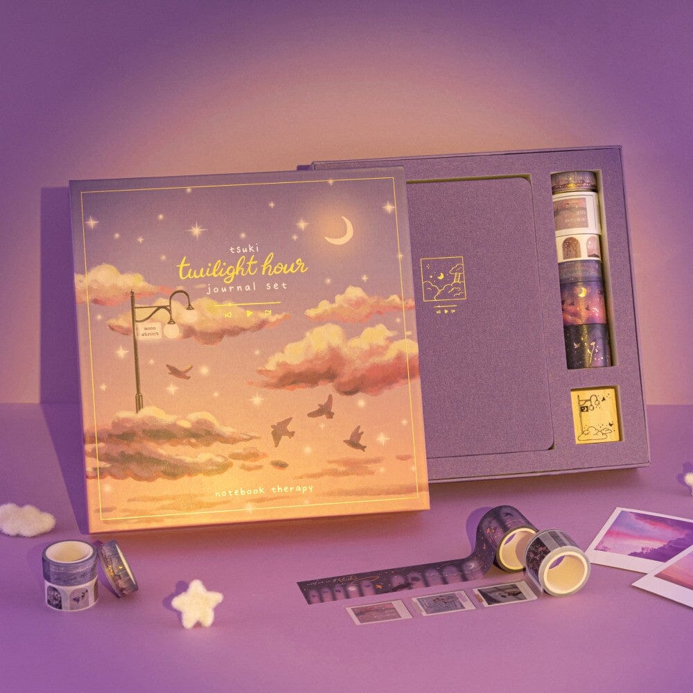 Tsuki Twilight Hour bullet journal set box on purple background with sunlight effect