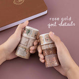 Tsuki ‘Vintage Rose’ Washi Tape Set with rose gold foil details held in hands with Tsuki ‘Vintage Rose’ Limited Edition Bullet Journal on mauve background