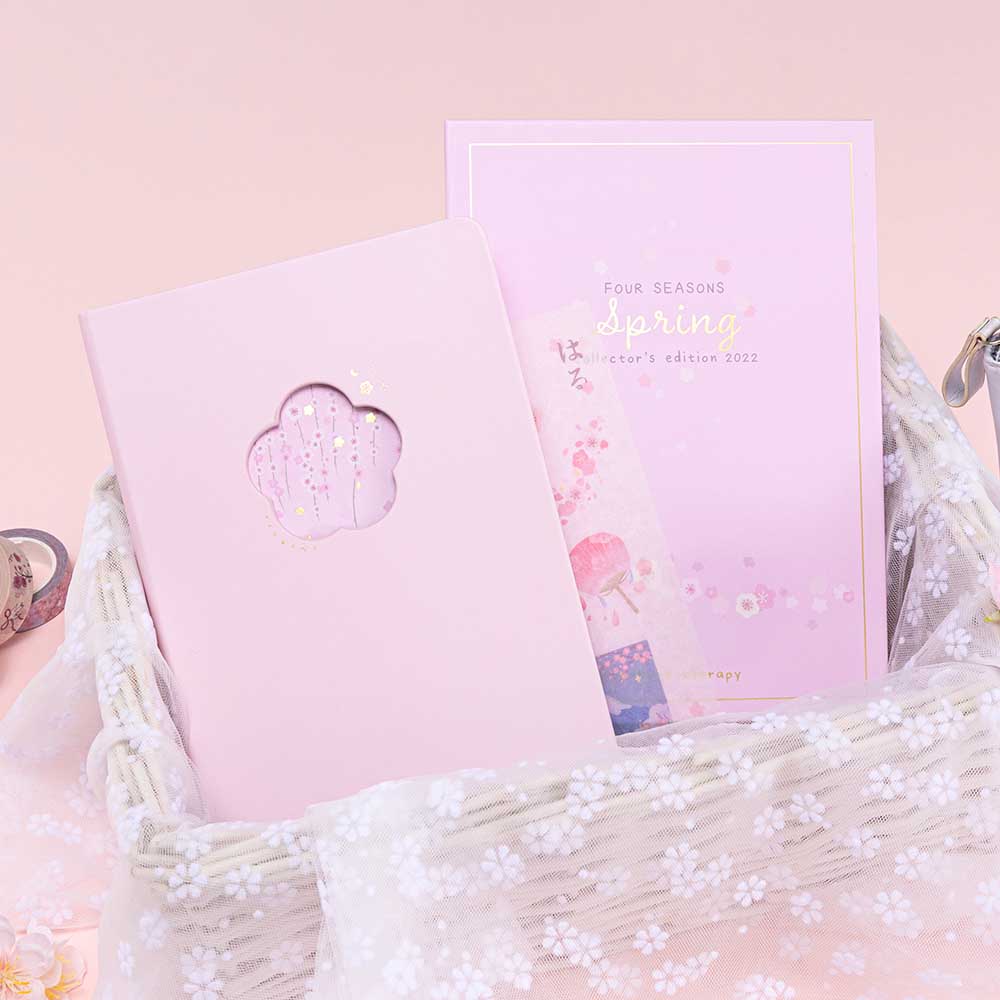 Tsuki Four Seasons: Spring Collector’s Edition 2022 Bullet Journal in netted basket in light pink background