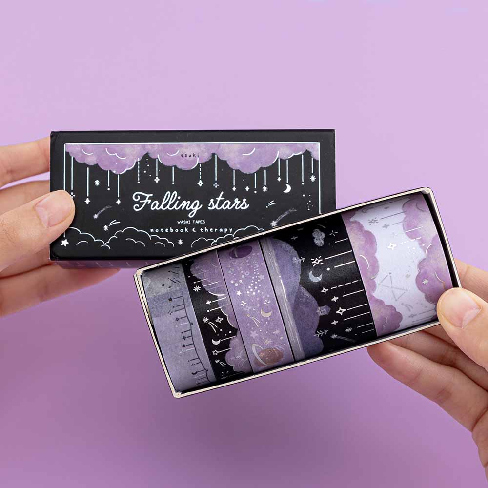 Tsuki ‘Falling Star’ Washi Tape Set held in hands in purple background