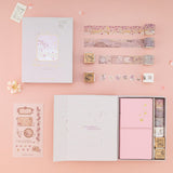 Flatlay of Tsuki Sakura Breeze travel notebook gift set by Notebook Therapy