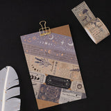 Tsuki ‘Moonlit Alchemy’ Washi Tape Set on kraft paper board with gold clip
